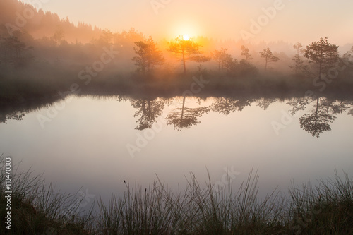 Beautiful sunrise next to Saint Anna lake in Transylvania © oliverleicher