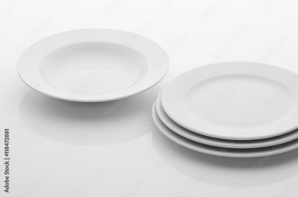kitchen and restaurant utensils, plates, on a light background kitchen and restaurant utensils, plates, on a light background