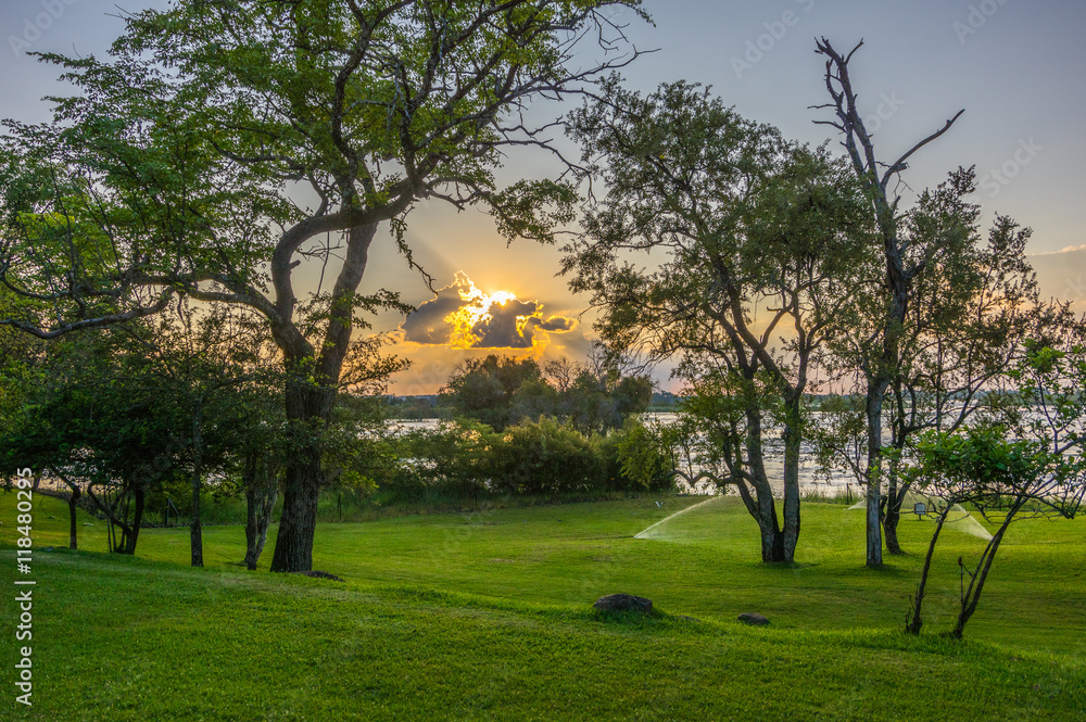 Beautiful Sunset over the Zambezi River, Zambia, The Zambezi is the fourth longest river in Africa Beautiful Sunset over the Zambezi River, Zambia, The Zambezi is the fourth longest river in Africa