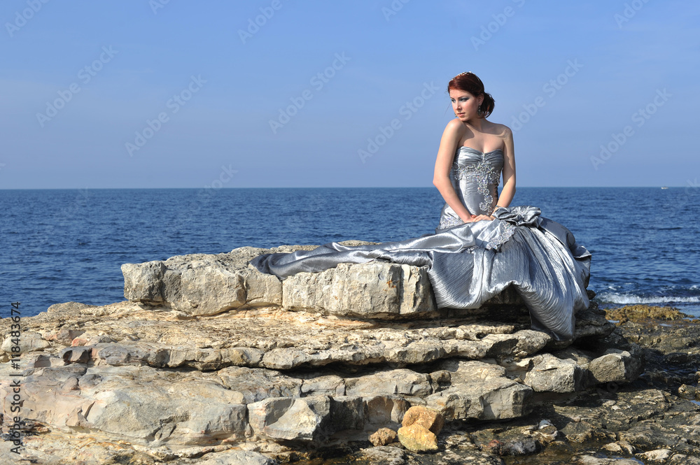 beautiful young fashion model posing on nature with fashion dress beautiful young fashion model posing on nature with fashion dress