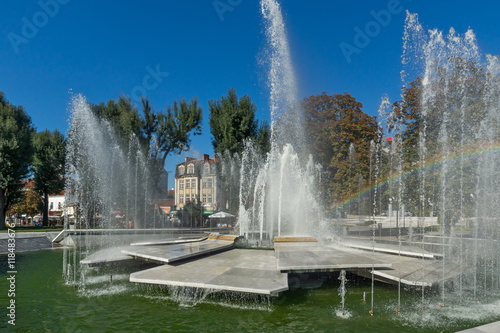 Panoramic view of Fountain and rainbow in the center of City of Pleven, Bulgaria