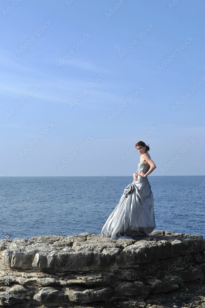 beautiful young fashion model posing on nature with fashion dress beautiful young fashion model posing on nature with fashion dress