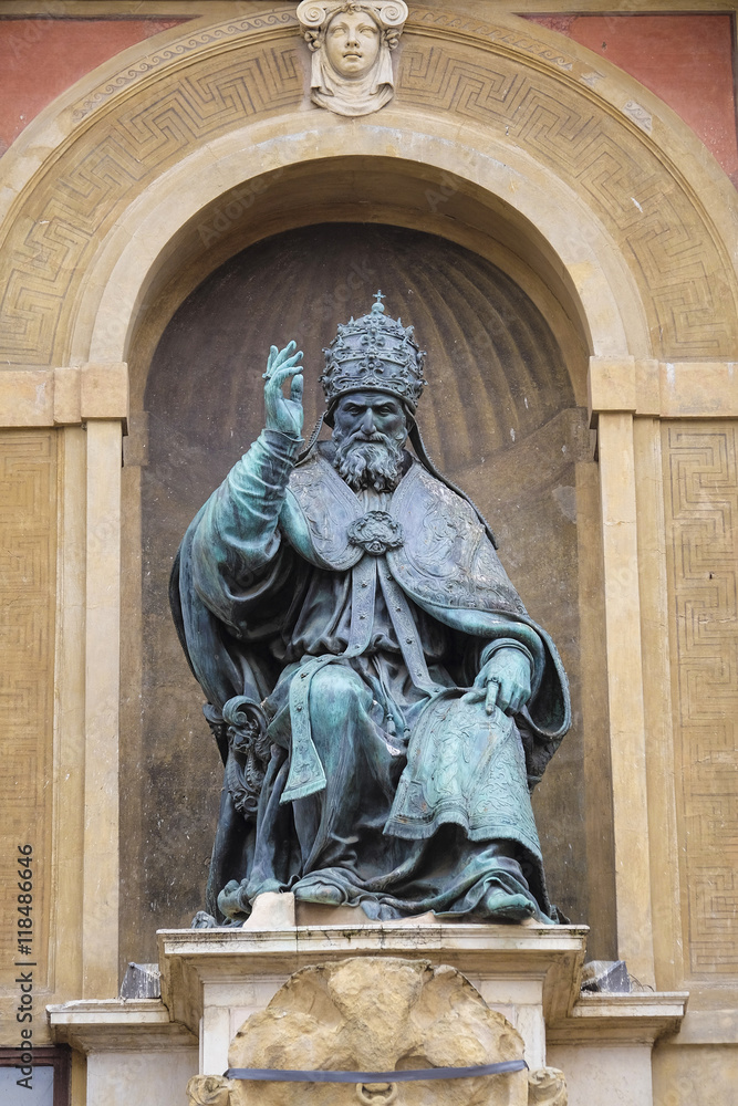 BOLOGNA , ITALY - DECEMBER 28, 2015 : Pope Gregory XIII statue on King Enzo palace at Bologna main square