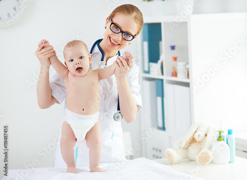 Doctor pediatrician and baby patient photo