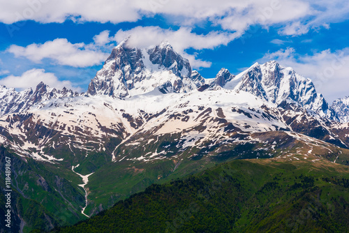 Mountain Ushba (in the center), 4690 m, and the surroundings. Svaneti region, Georgia. Ushba known as the "Matterhorn of the Caucasus" for its scenic, spire-shaped double summit