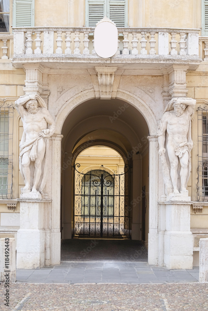MANTUA, ITALY - JULY, 23, 2016: sculptures on a facade of Castiglioni palace in Mantua, Italy