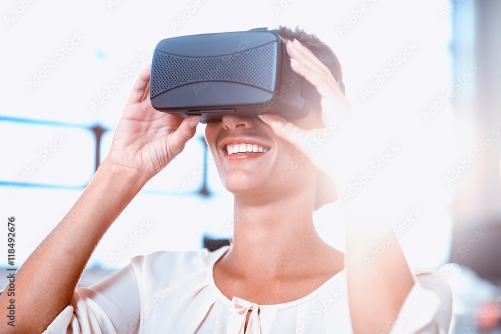 Young woman using the virtual reality headset Young woman using the virtual reality headset