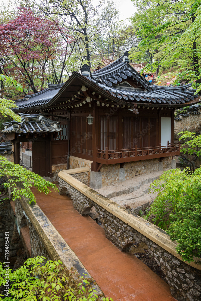 Small bridge to Gilsangheon - a wooden building, living quarters for master sunim (senior monks) at the Gilsangsa Temple in Seoul, South Korea. Small bridge to Gilsangheon - a wooden building, living quarters for master sunim (senior monks) at the Gilsangsa Temple in Seoul, South Korea.