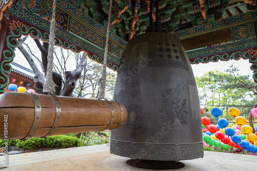 Photography Close-up of a wooden beam and a Bonshō (a Buddhist bell, hanging bell or great bell) at Bell Pavilion at Gilsangsa Temple in Seoul, South Korea