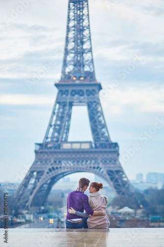 Romantic couple near the Eiffel tower in Paris, France © Ekaterina Pokrovsky