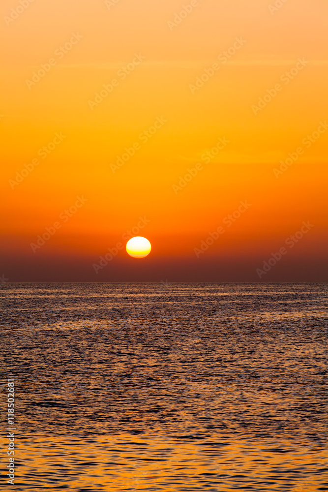 beautiful sunset above the sea.  Colorful sunset over water surf
