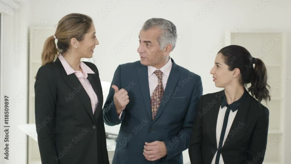 Portrait of smiling Western & Middle Eastern business group Portrait of smiling Western & Middle Eastern business group