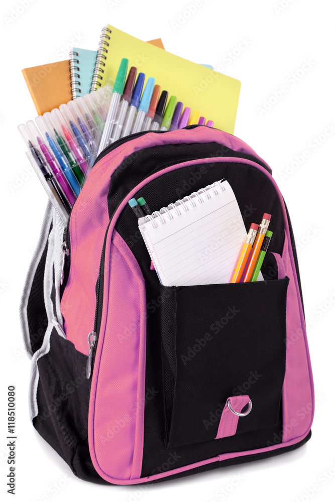One single school bag or backpack filled with book crayon felt pen and notebook for study or homework isolated on white background photo One single school bag or backpack filled with book crayon felt pen and notebook for study or homework isolated on white background photo