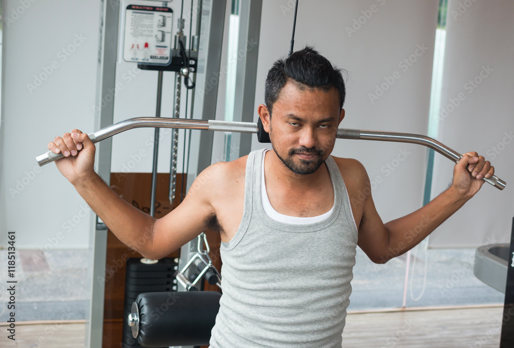 Fototapeta premium exercises in fitness sport club 