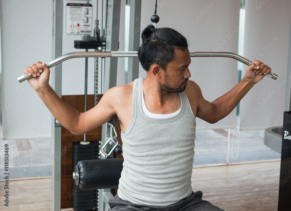 Fototapeta premium exercises in fitness sport club