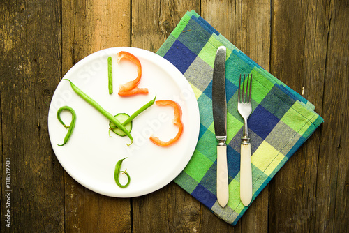 Watch made from vegetables are on the plate