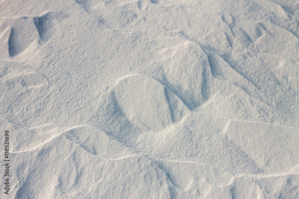 Fototapeta premium background snow waves at sunset by the wind