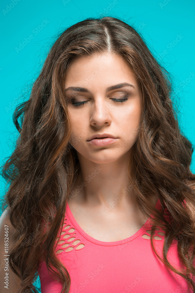 The young woman's portrait with thoughtful emotions The young woman's portrait with thoughtful emotions