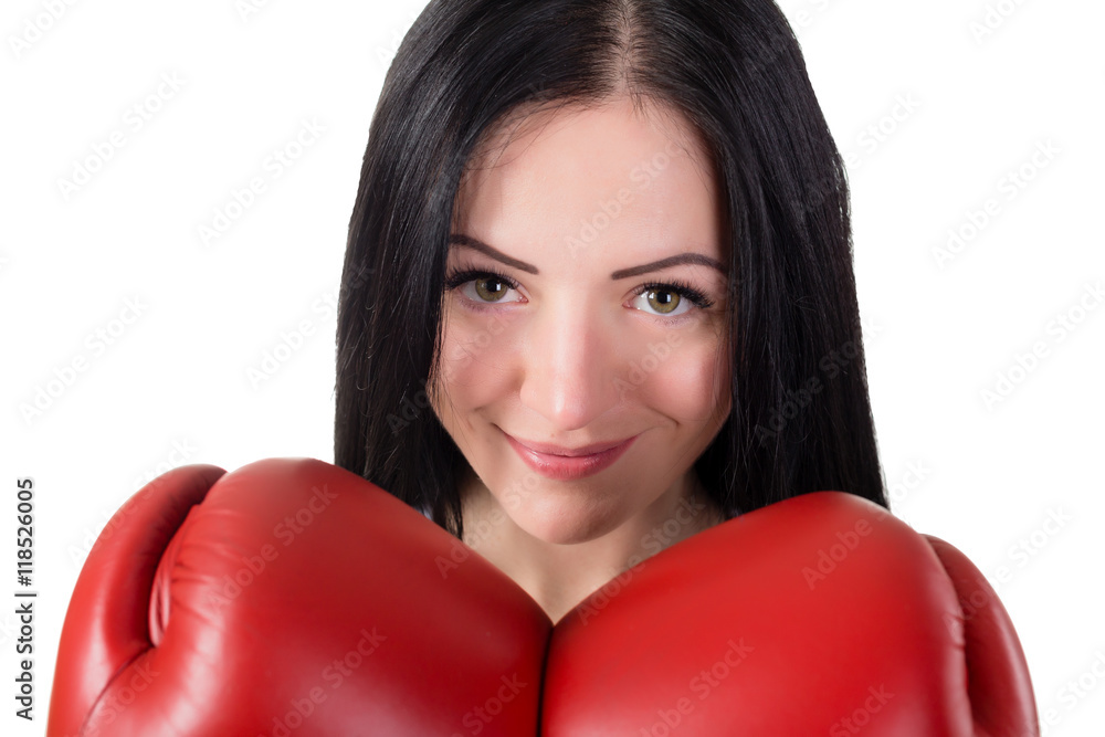 Portrait of smiling young brunette woman with red boxing gloves. Portrait of smiling young brunette woman with red boxing gloves.