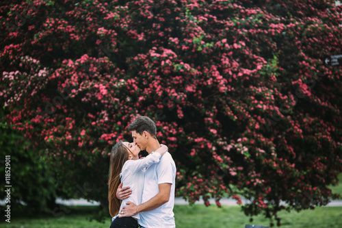 Young happy couple in love outdoors