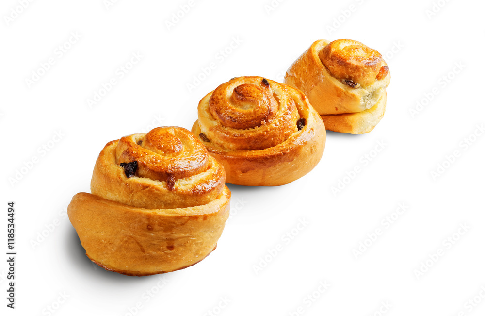 Three buns with raisin isolated on white.