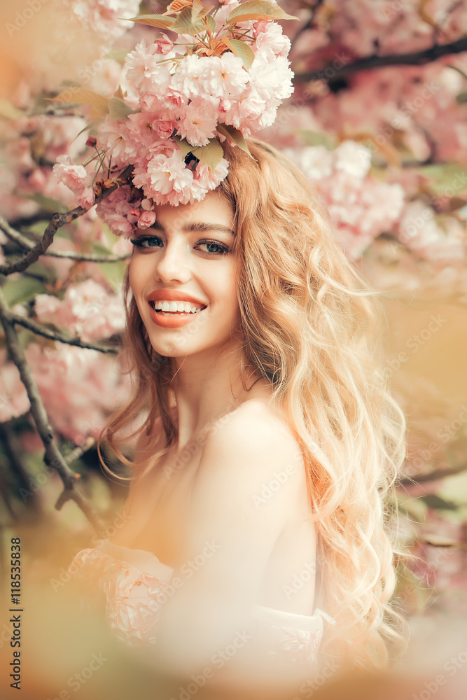 Glamour girl in pink blossom