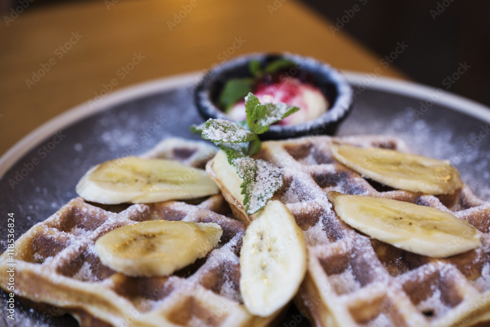 Belgian waffles with ice cream and bananas Belgian waffles with ice cream and bananas