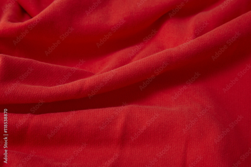 A full page close up of red sweats material texture A full page close up of red sweats material texture