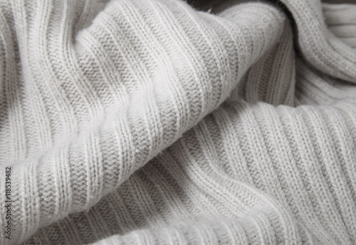 Fotografija A full page close up of cream chunky knitted jumper fabric texture