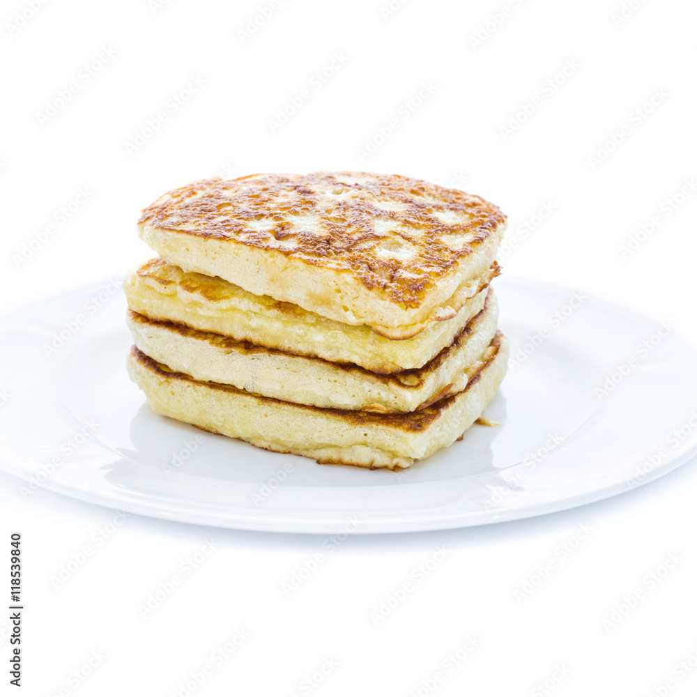 Pile of heart shaped pancakes on white plate Pile of heart shaped pancakes on white plate