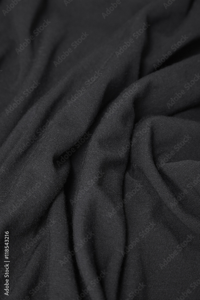 A full page close up of soft black cotton fabric texture A full page close up of soft black cotton fabric texture