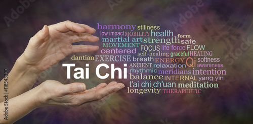Tai Chi Word Cloud - female hands cupped around the words TAI CHI surrounded by a relevant word cloud on a rich complex multi colored background photo