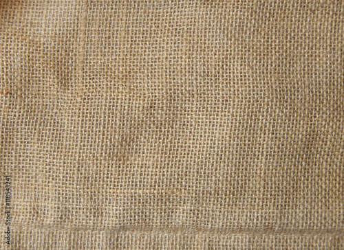A full page close up of natural colored burlap sack material texture