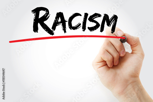 Fotografie Hand writing Racism with marker, concept background