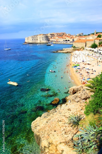 Coast, sea and beautiful beach Banje with Dubrovnik old town in background in Croatia 