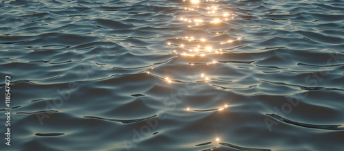 Fotografia Sparkling sunlight on oceanic waves