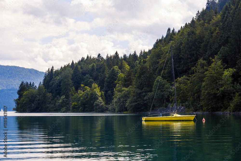 The yacht on mountain lake