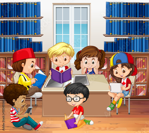 Boys and girls reading in library