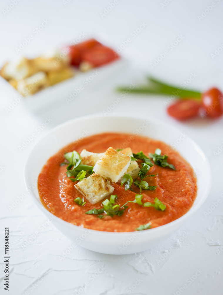 Tomato soup in white plate Tomato soup in white plate