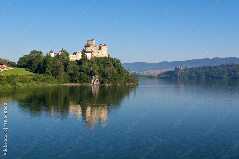 A beautiful view of medieval Dunajec castle in Niedzica village in the morning. Czorsztyn castle in background. Poland. Europe.