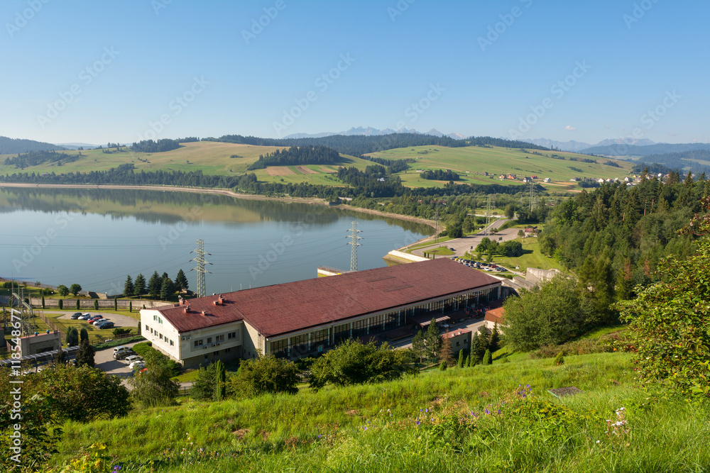 A view of hydroelectric power plant from dam in Niedzica. Poland. Europe.
