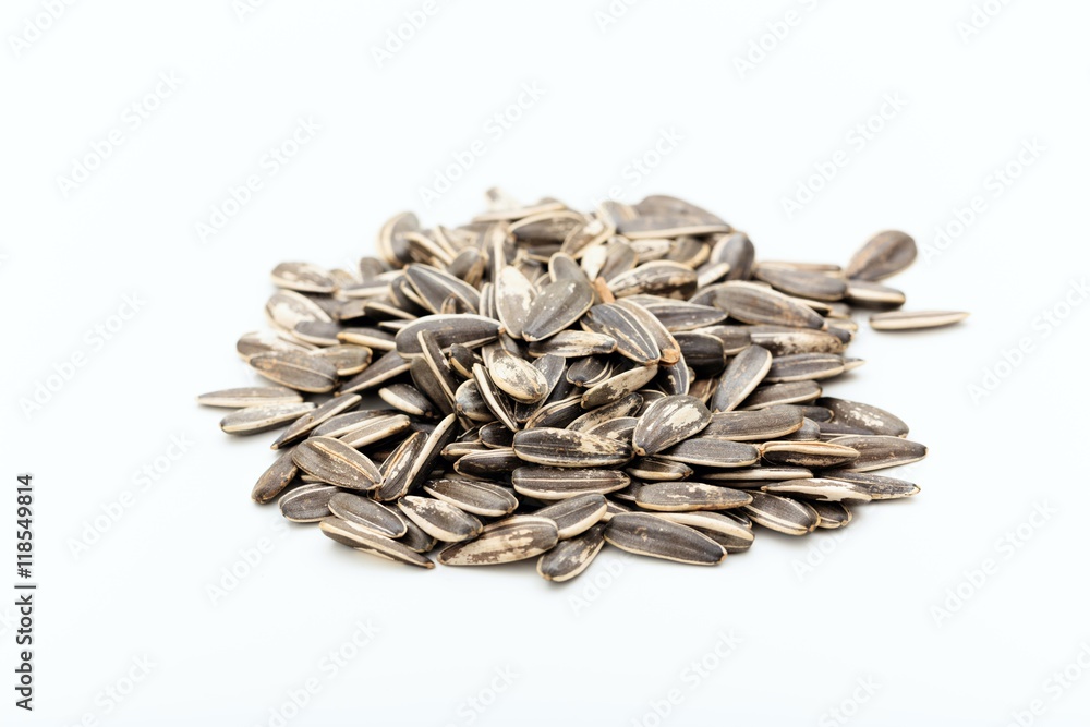 Sunflower seeds on white background Sunflower seeds on white background