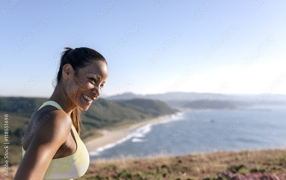 Spain, Asturias, portrait of a sportswoman, smiling