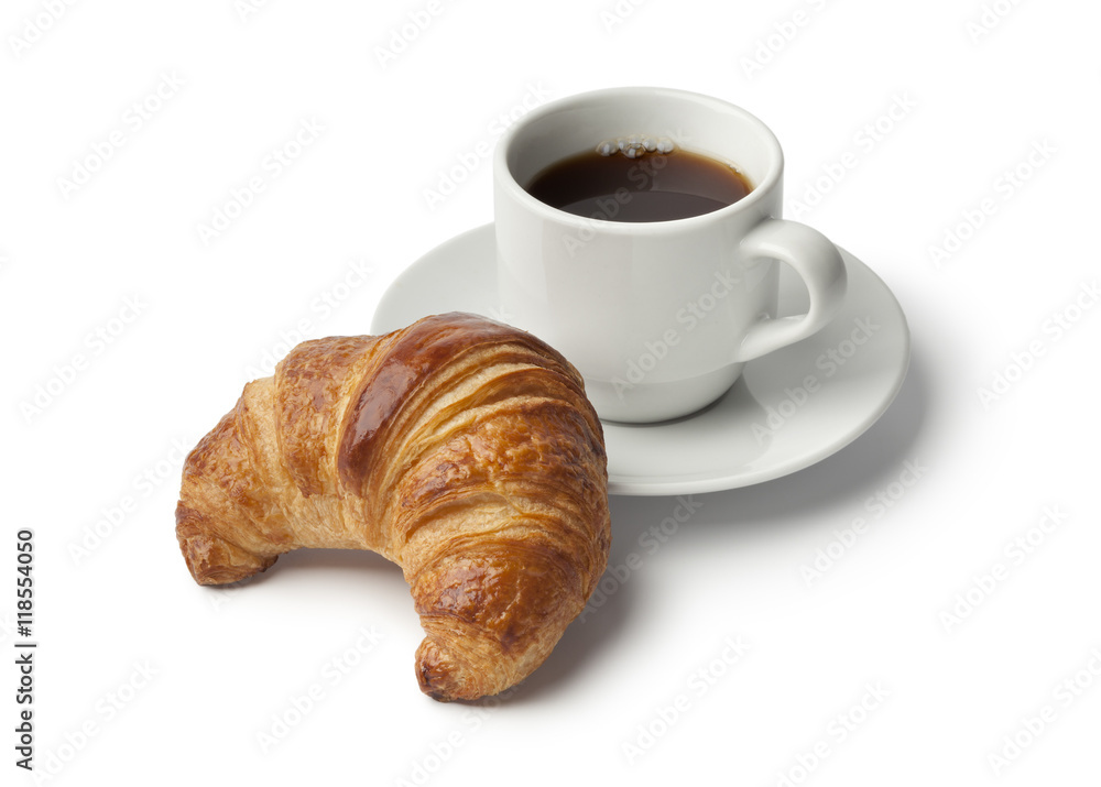 Fresh baked croissant and a cup of coffee Fresh baked croissant and a cup of coffee