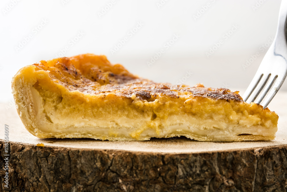 Homemade pumpkin pie on wooden background
Homemade pumpkin pie on wooden background
