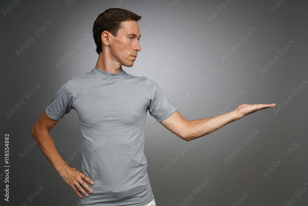 Man holding something on his palm.