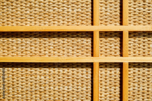 Wicker pattern with grid of wooden bars