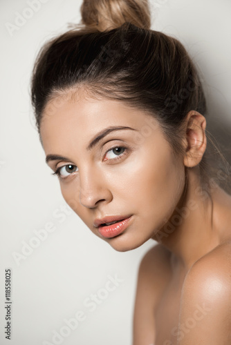 Close up portrait of young beautiful naked girl.