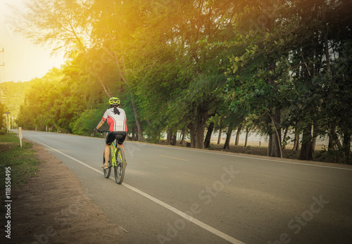 Wallpaper Mural Woman Cycling outdoor exercise bike paths near the beach Torontodigital.ca