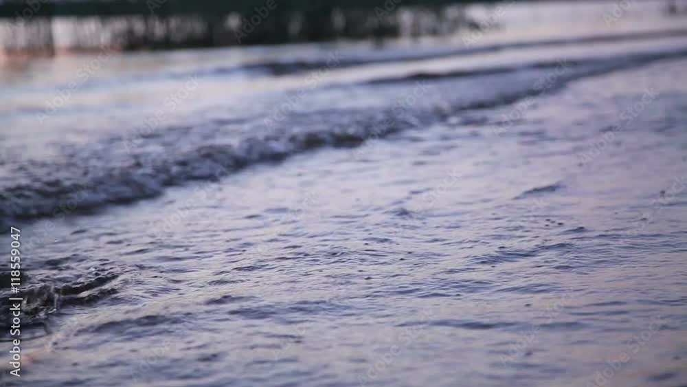 Girl walks on water at sunset Girl walks on water at sunset